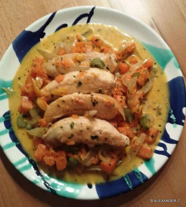 Hühnerfiletspitzen auf Kürbisgemüse