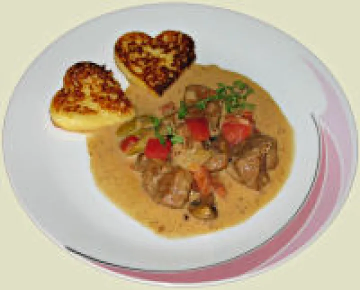 Kalbsragout mit Tomaten und Pilzen